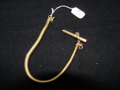 CHAÎNE DE MONTRE et clé en or jaune 18 k...