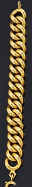 BRACELET articulé en or jaune 18 k (750°/oo),...