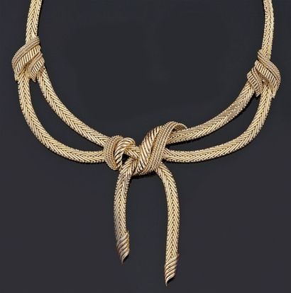 COLLIER articulé en or gris 18 k 750°/oo...
