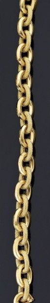 BRACELET articulé en or jaune 18 k ajouré,...