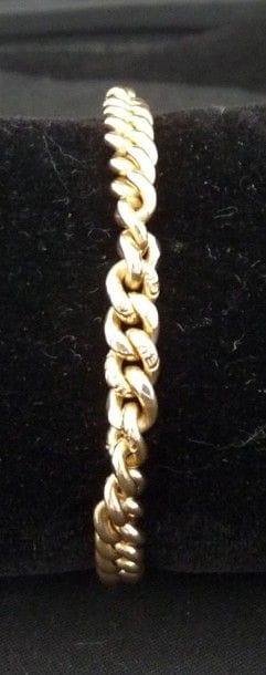 BRACELET articulé en or jaune 18 k 750°/oo,...
