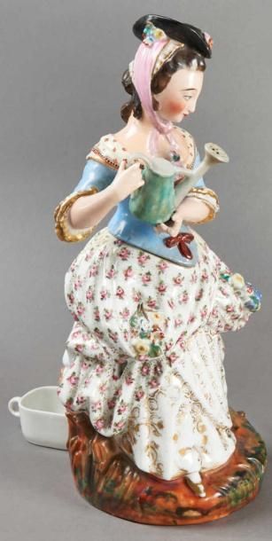 TISANIERE en porcelaine à décor polychrome...