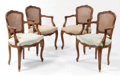 SUITE DE QUATRE FAUTEUILS en bois naturel...