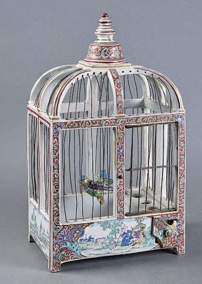 CAGE en faïence polychrome surmontée d'un...