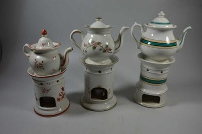 TROIS TISANIERES - L'une à décor floral rouge,...