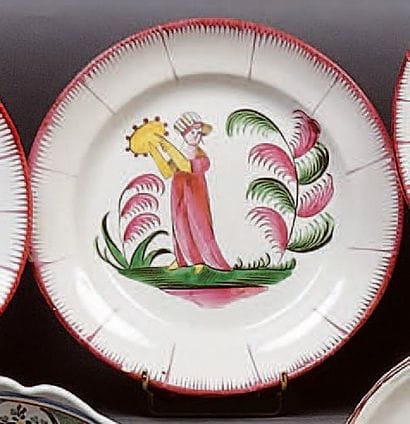 LES ISLETTES
Assiette à bord uni, à décor...