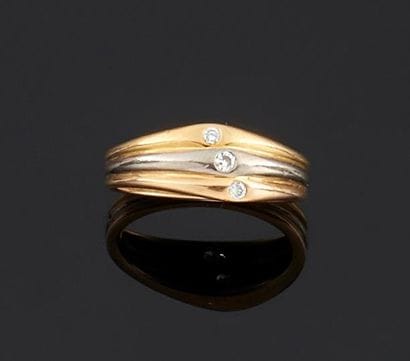 CARTIER
Bague en or 750°/oo de trois tons,...