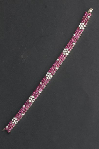 BRACELET souple et articulé en or gris 750°/oo...