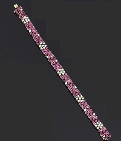 BRACELET souple et articulé en or gris 750°/oo...