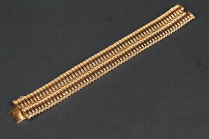 BRACELET ruban souple en or jaune 750°/oo...