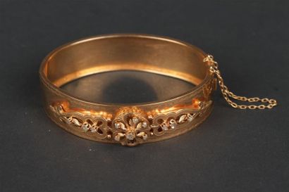 BRACELET rigide ouvrant en or jaune 750°/oo...