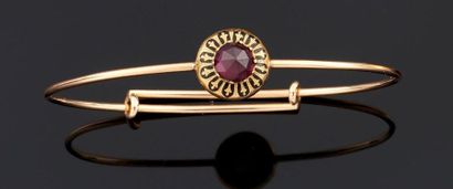 BRACELET rigide en or jaune 750°/oo orné...
