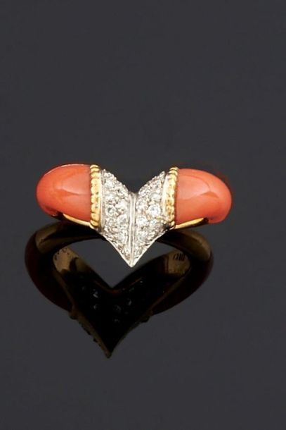 BAGUE en or jaune 750°/oo orné d'un pavage...