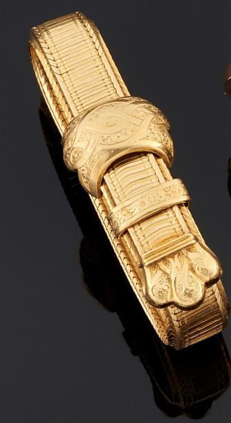 BRACELET souple en or jaune 750°/oo, le fermoir...