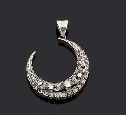 PENDENTIF en or jaune 750°/oo et argent 950°/oo...
