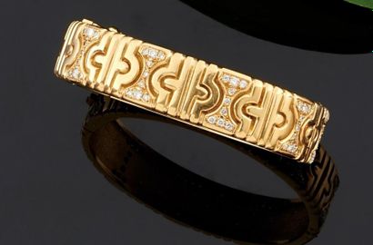 BRACELET rigide ouvrant en or jaune 750°/oo...