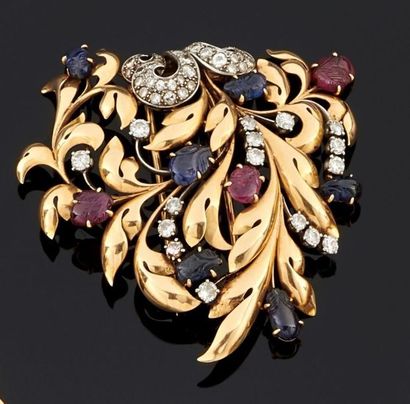 BROCHE clip en or jaune 750°/oo et platine...