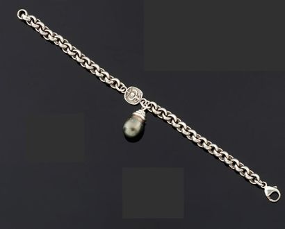 BRACELET articulé en argent 925°/oo retenant...