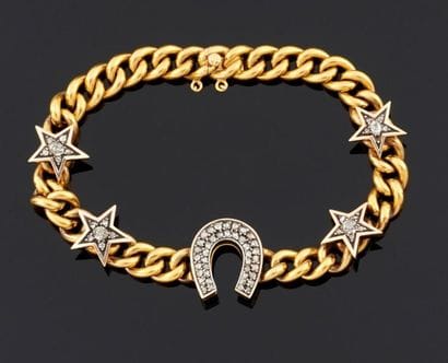 BRACELET articulé en or jaune 750°/oo et...