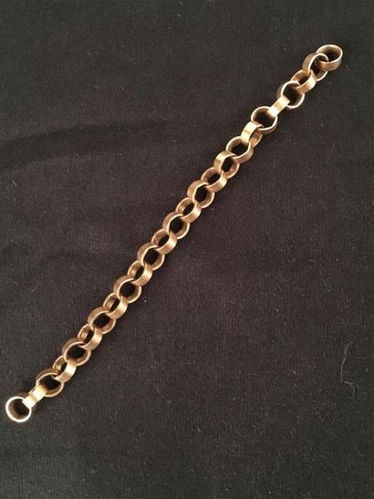 BRACELET articulé en or jaune 750°/oo, les...