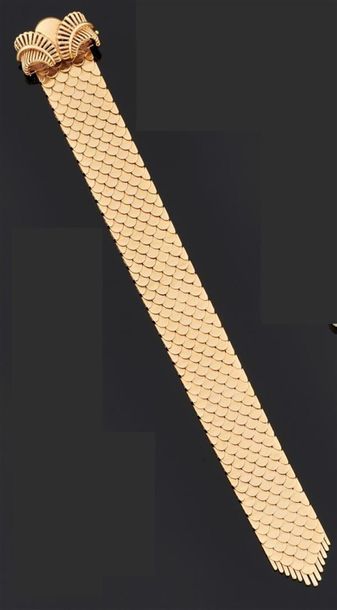 BRACELET souple en or jaune 750°/oo les maillons...