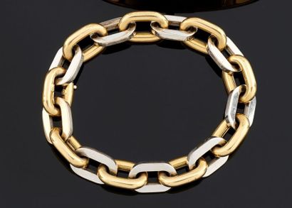 BRACELET articulé en or 750°/oo de deux tons,...