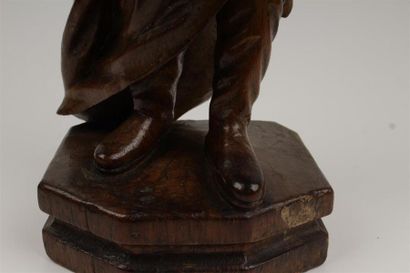 SUJET en bois naturel sculpté figurant le...
