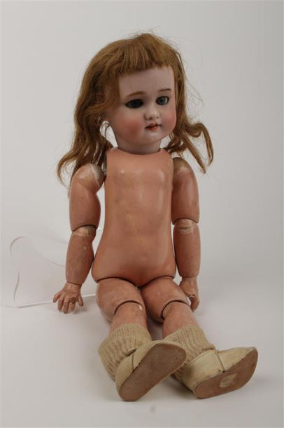 BEBE JUMEAU
Poupée à tête en porcelaine à...