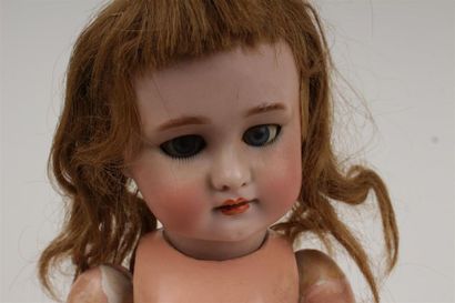 BEBE JUMEAU
Poupée à tête en porcelaine à...