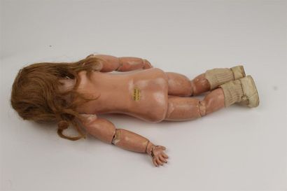 BEBE JUMEAU
Poupée à tête en porcelaine à...