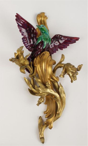 APPLIQUE en bronze figurant une patte d'oiseau...