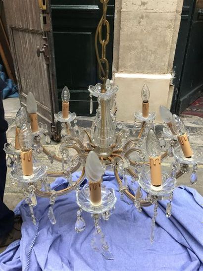 LUSTRE en verre et laiton doré à onze bras...