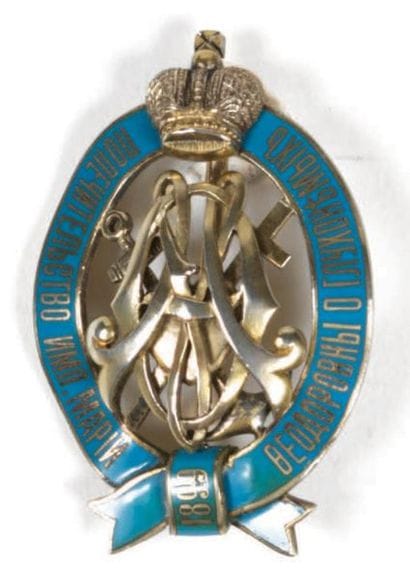BADGE DE L'INSTITUTION DES SOURDS ET MUETS...