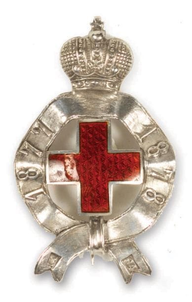 INSIGNE DE LA CROIX ROUGE pendant la guerre...