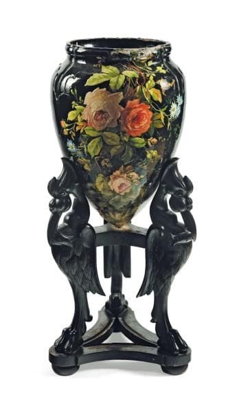 Vase en céramique émaillée à décor de fleurs....