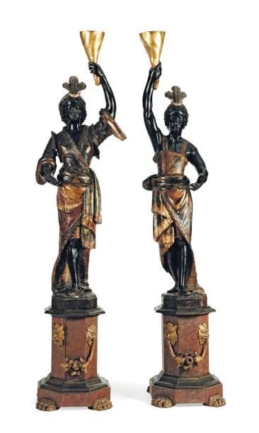 Paire de nubiens porte torchères, en bois...