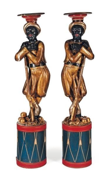 Paire de chasseurs nubiens en bois peint...