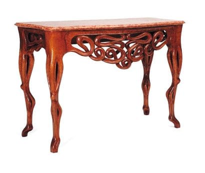 Console en bois sculpté et ajouré à quatre...