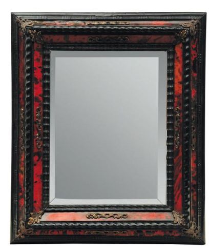 Miroir en écaille, cuivre verni et bois noirci,...