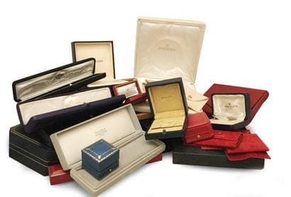 
Lot including about fifty cases signed by...
