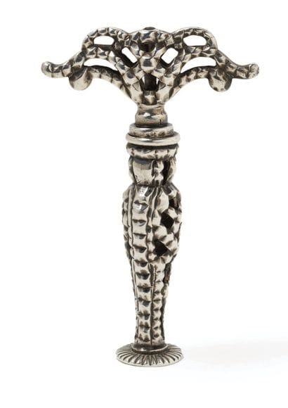 SILVER AND METAL TIRE-BOUCHON Antwerp, 1779
Date...