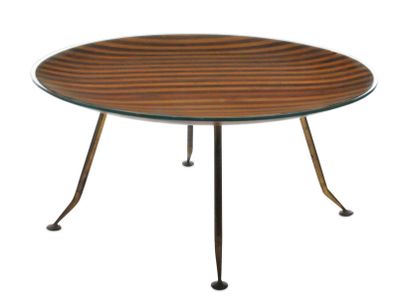 Rare table basse à plateau circulaire et...