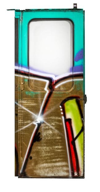 FEITO 
Spray can on Paris subway door 
191...