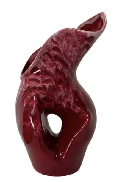BRAZIL, 20th century
Magenta glazed ceramic...