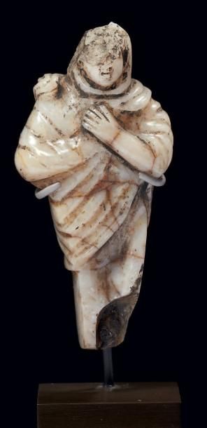 STATUETTE en forme de pilier surmonté d'un...