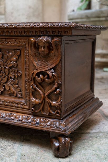 Large carved and molded walnut chest. The...