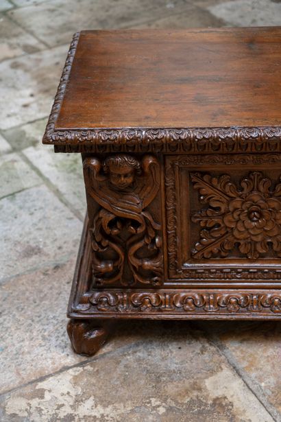 Large carved and molded walnut chest. The...