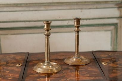 Pair of polished brass candlesticks with...