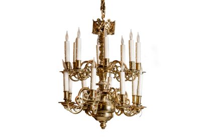 Polished brass chandelier with twelve lights...