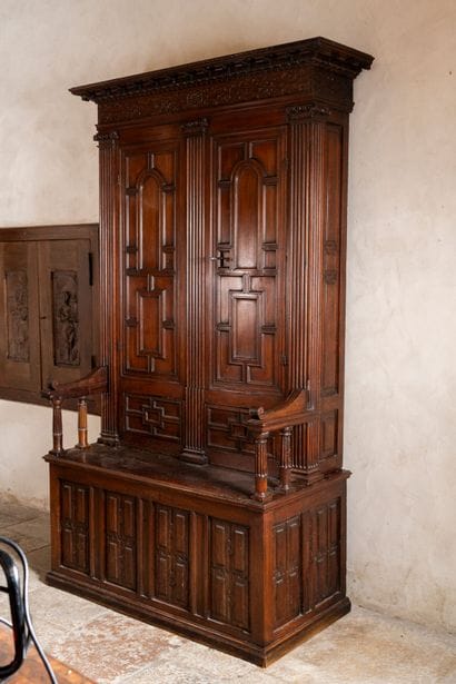 Moulded and carved walnut double cabinet...